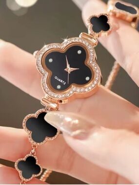 Kohl's Rose Gold and Black Clover Bracelet Watch